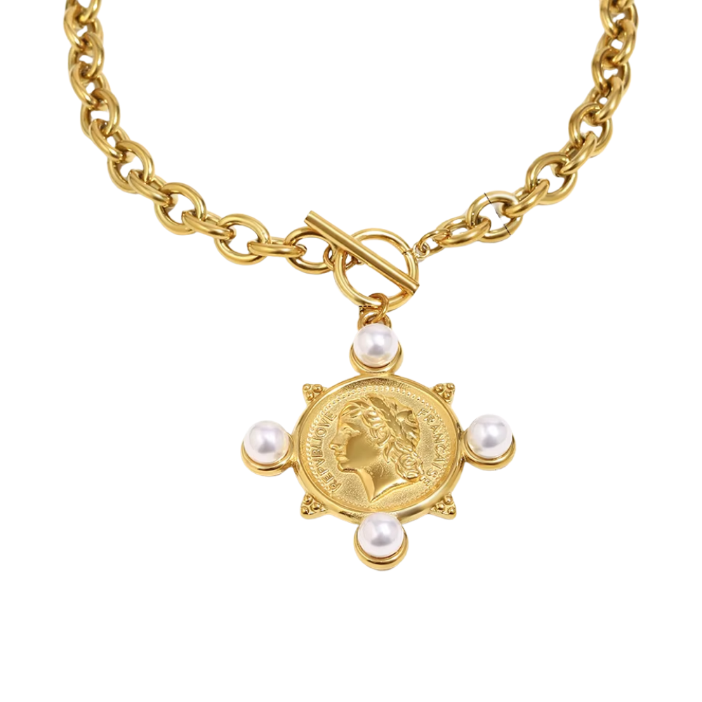 Gold necklace with a coin and pearl pendant on a white background
