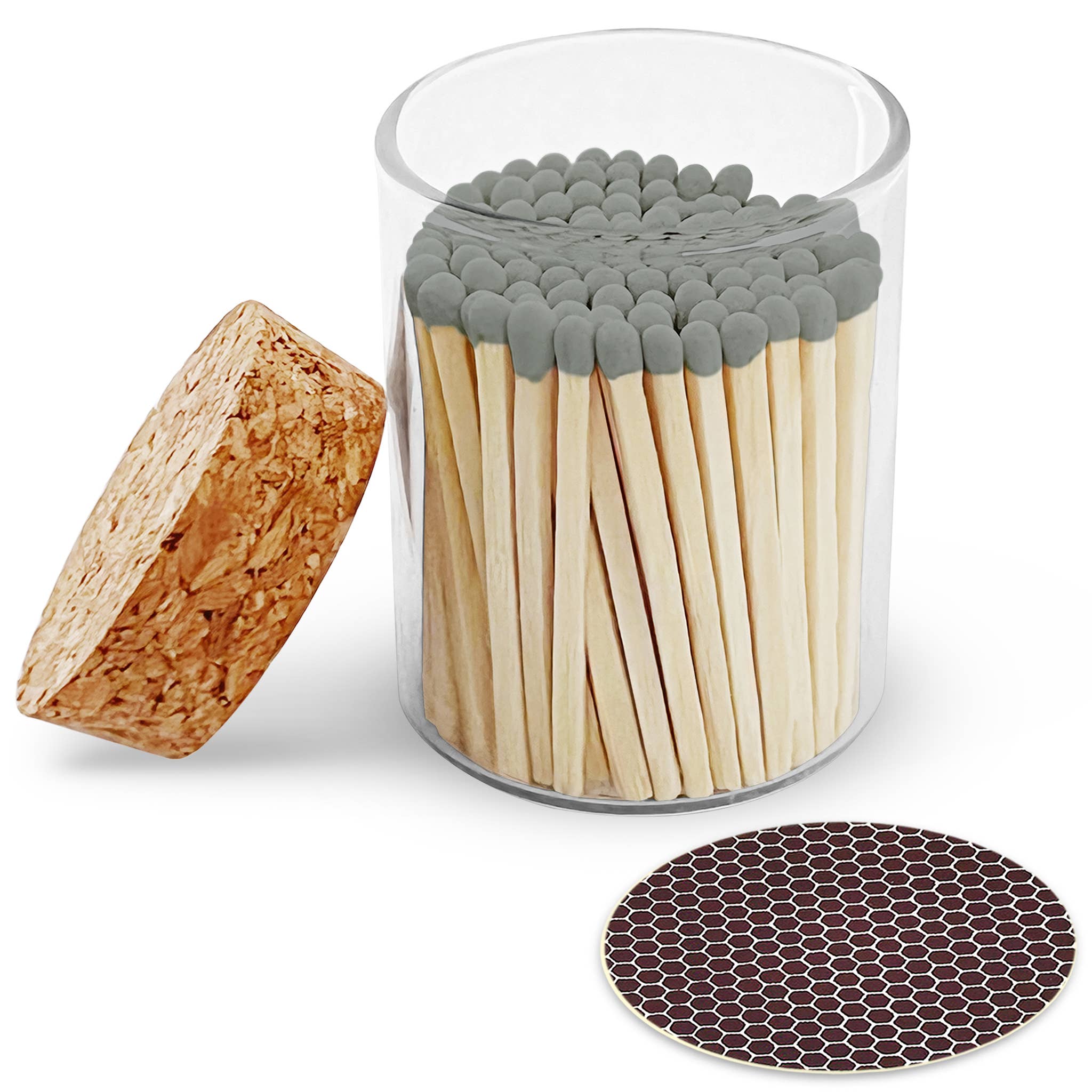 Matches with a wooden block and hexagonal coaster on a white background